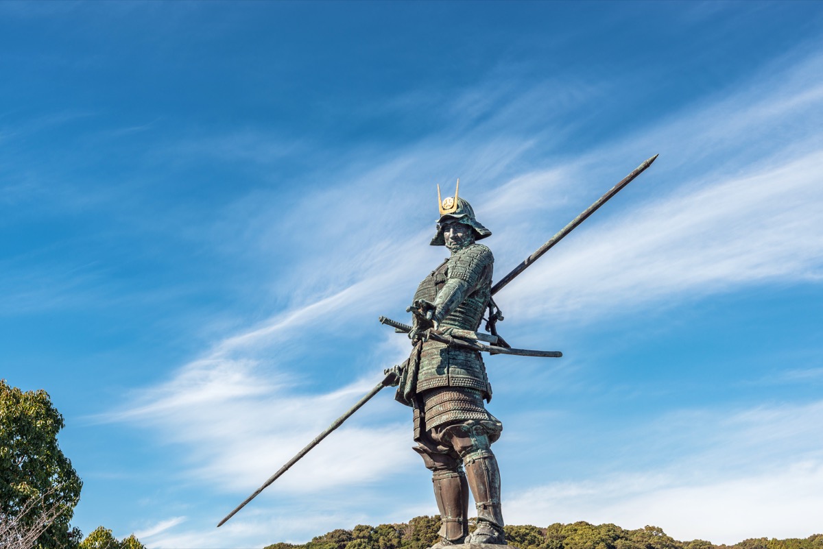 Samurai statue against Kyoto sky